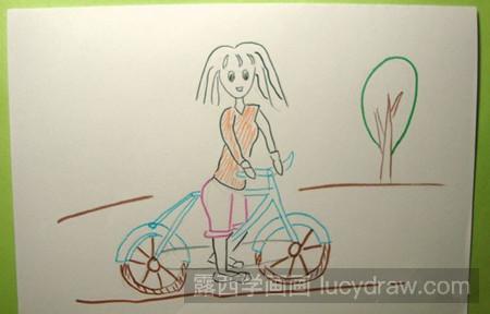 教你画骑自行车的小女孩